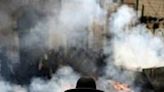 Ultra-Orthodox Jews burn leavened items in Jerusalem during preparations for the start of the Passover holiday