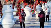 Smaller snowmen a hit with Harbin revelers