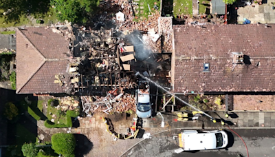 Neighbours pull man from rubble after explosion