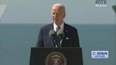 Former Army Ranger gets applause at Biden's speech at Pointe du Hoc Ranger Monument at Omaha Beach.
