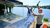 Nipmuc create a traditional mishoon dugout canoe in Shrewsbury