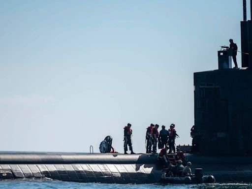 Navy SEALs dropped in on a nuclear-powered submarine in the Pacific, drilling for a higher-end fight