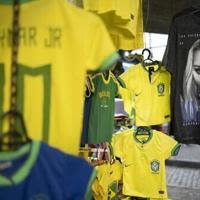 Madonna-related merchandise is sold along with soccer gear in a shop in central Rio on April 29, 2024