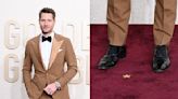 Justin Hartley Suits Up in Patent Leather Shoes for Golden Globes 2024