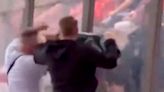 Watch fuming Aston Villa fan headbutt barrier as Olympiacos supporters taunt him