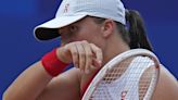 Olympics tennis: No. 1 Iga Swiatek gets hit by a ball but wins when Danielle Collins of the US stops