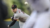 Harrison efficiently passes first Coors Field test in Giants' win