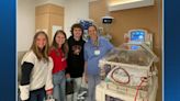 Triplets who ‘beat all the odds’ reunite with NICU staff before high school graduation