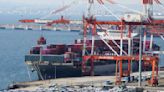 Japan records a trade deficit for the third straight fiscal year despite recovering exports