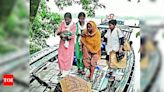 Assam flood: Sandbar dweller delivers baby on rescue boat in Morigaon | Guwahati News - Times of India