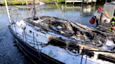 PHOTOS: Fire destroys 45-foot sailboat docked behind Apollo Beach home