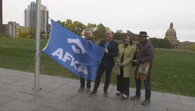 Flag raised on legislature grounds to mark start of Foster and Kinship Caregiver Month