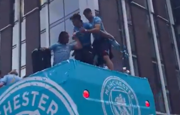 Watch: Jack Grealish nearly falls off bus TWICE during Man City title parade