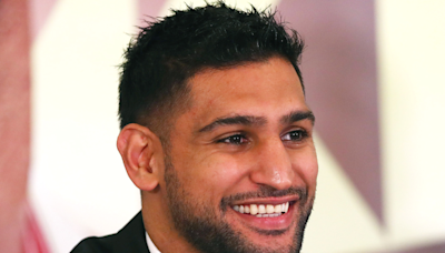 Amir Khan sends his £120,000 Range Rover to valet with his daughter still in the back seat