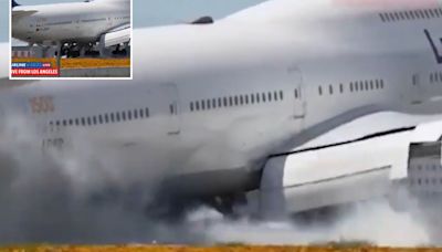 Moment Boeing 747 bounces along runway twice before aborting rough landing