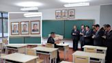 North Korea unveils Kim Jong Un portrait next to predecessors.