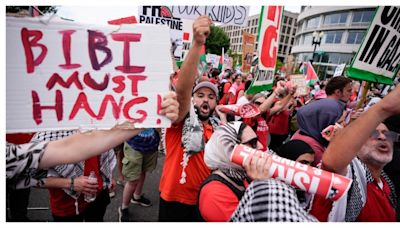 Protesters burn US flags, Netanyahu effigy blocks from Capitol