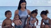 Kim Kardashian Recreates This Stylish Beach Photo With Her Kids Nearly 3 Years Later
