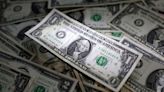 Dollar dips as jobless claims increase