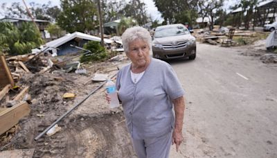 At least 64 dead and millions without power after Helene's deadly march across the Southeast