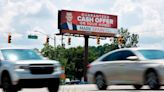 ‘Guaranteed cash offer’: His face is on hundreds of NC billboards. Who is Mark Spain?