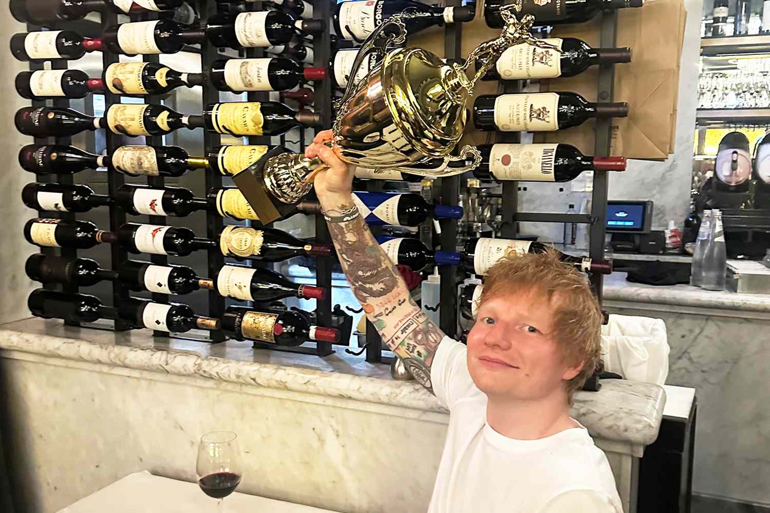 Ed Sheeran Feasts on Italian (and Scores an Arm-Wrestling Trophy!) Before Playing Boston Calling (Exclusive)