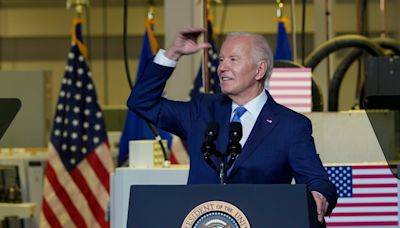 Biden lauds new Microsoft center on the same site where Trump's Foxconn project failed