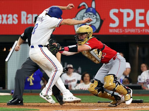 Angels' Carson Fulmer gives up winning run in 13th inning by hitting a Rangers batter