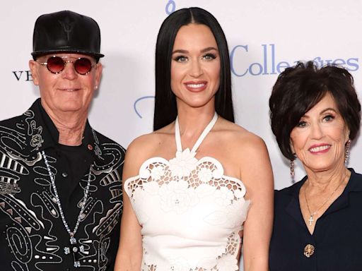 Katy Perry Supported by Her Parents on the Red Carpet as She Dazzles in the Perfect White Dress