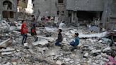 Children play in rubble of Gaza for Eid holiday