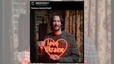 Fact Check: This Photo Supposedly Shows Keanu Reeves Holding a 'Love Ukraine' Sign. Here's the Truth