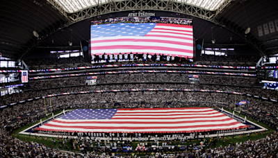 El Paso law enforcement carry US flag on field during Cowboys vs Saints game on Sunday