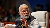 Inflation hurting Modi, but still likely to win India's 2024 polls - survey