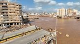 Satellite images show scale of Libya devastation as mass graves used to bury dead