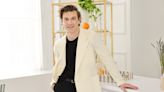 Jeremiah Brent just decorated a fun, festive mantel using Crate & Barrel's Christmas collection