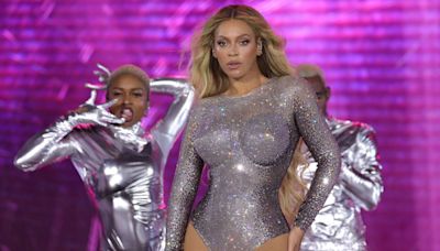 Beyoncé Wore a Sheer Lace Bodysuit and Thigh-high boots to Take Public Transit