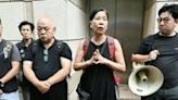 Veteran Hong Kong activist Chan Po-ying, wife of jailed pro-democracy campainger Leung Kwok-hung, speaks to the media outside the court before the verdict