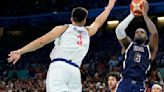 US men's basketball team rolls past Serbia 110-84 in opening game at the Paris Olympics