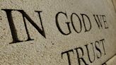 Texas schools are required to put up posters of the national motto 'In God We Trust,' and critics say the law imposes religion on children