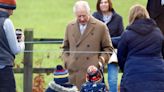 King Charles Stops to Chat with 'Shell-Shocked' Young Brothers in Toy Land Rover During Church Outing