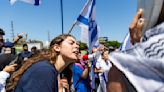 Pro-Palestinian activists and Israel supporters clash outside West L.A. synagogue