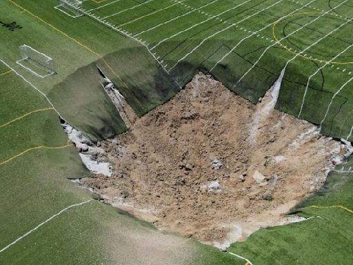 Watch: Massive sinkhole swallows soccer field in US