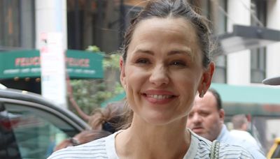 Jennifer Garner looks jovial signing autographs for fans in NYC