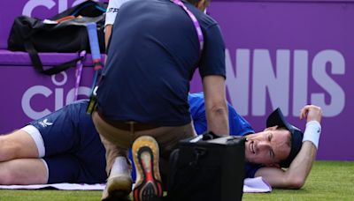 Andy Murray waits on scan after back injury threatens Wimbledon 'farewell'