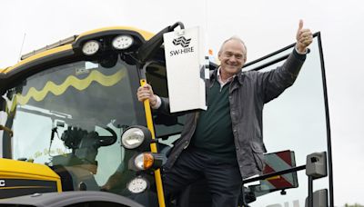 Ed Davey drives tractor in new Lib Dem stunt as he vows to knock down Blue Wall