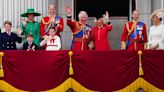 King thanks Trooping crowds from palace balcony as young Louis plays up – again