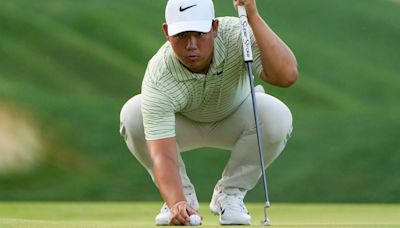 Kim clings to 1-shot lead in delayed Travelers