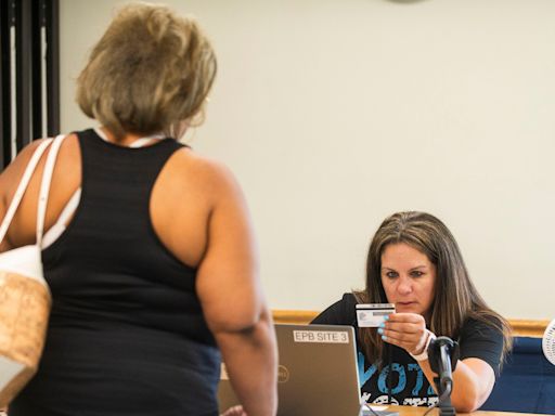 Technology issue disrupts first day of early voting in Michigan primary