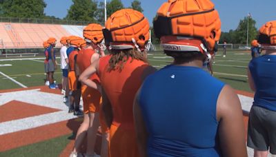 Lancaster County football players wearing Guardian Caps to boost safety