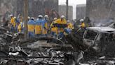 Death toll reaches 100 as survivors are found in homes smashed by western Japan earthquakes